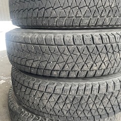 ジムニー純正アルミと予備タイヤの画像