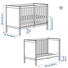 IKEAベビーベッド、マットレス、カバー付きの画像