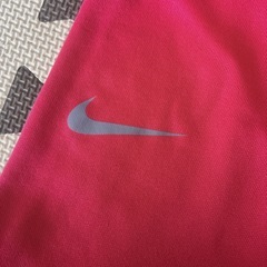 NIKE ピンク裏フリース フード付きパーカー Lサイズの画像