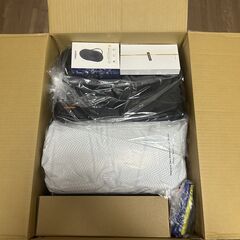 段ボールいっぱいの不用品の画像