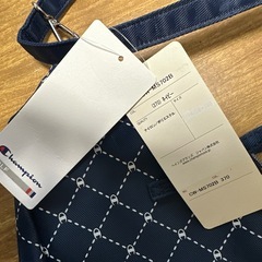 ネイビーカラーのチャンピオントートバッグの画像