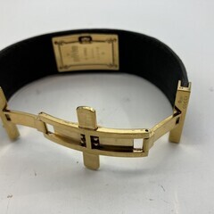 GUCCI グッチ 7800S バングルウォッチ 黒文字盤 GP×革 クォーツ レディース 腕時計 ゴールド系の画像