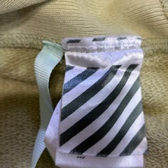 チャンピオン× オフホワイトオリーブグリーン パーカー フード付きの画像