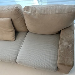 ベージュ L字型ソファ 布製 付属クッションありの画像