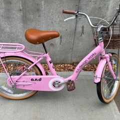 18インチ子供用自転車ピンク空気入れ付きの画像