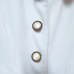 TRALALA　白リボン付コートの画像