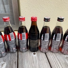 コカ・コーラのクラシックボトルとゼロの7本セット。  - 種類: コカ・コーラ - モデル: コカ・コーラ ゼロ - デザイン: クラシックボトル - 数量: 7本セット  ご覧いただきありがとうございます。の画像