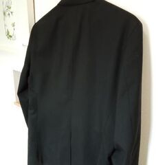 黒ストライプ　ビジネススーツの画像