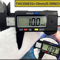 青緑とオレンジの不規則ラグの画像