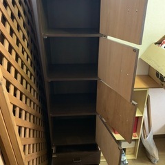 木目調の縦長収納ボックス、棚、ラックの画像