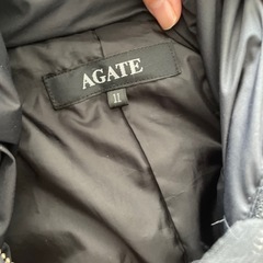 黒いモコモココートの画像