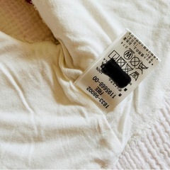 ホワイト フリース ベビーベスト リボン付きの画像