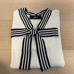 salire
トップスの画像