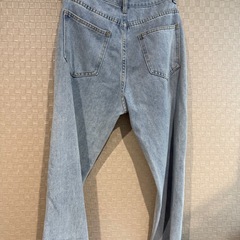 コートとジーンズの画像