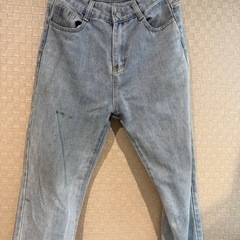 コートとジーンズの画像