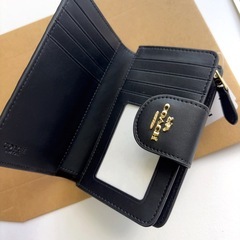 COACH ブラック シグネチャー 二つ折財布 【未使用】の画像