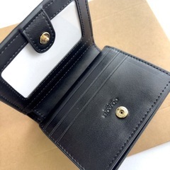 COACH ブラック デボスドシグネチャー 二つ折財布 【未使用】の画像