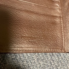 ブラウンレザー二つ折り財布の画像