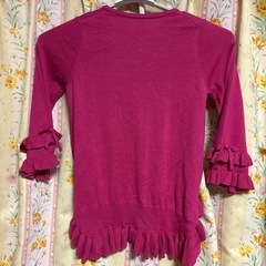 マゼンタ色ニット未使用の画像