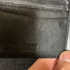 TAKEO KIKUCHI ブラック二つ折り財布の画像