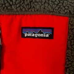 patagoniaパタゴニア レトロX ベスト          (オリーブグリーン‪✕‬オレンジ）の画像