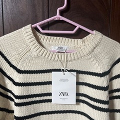 新品タグ付きZARAセーターLサイズ治療費の為お願いいたします。の画像
