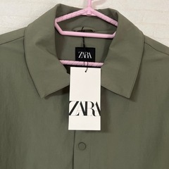 新品タグ付きZARAジャンバーLサイズの画像