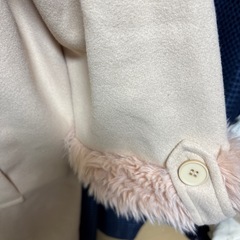 ベージュロングコートの画像