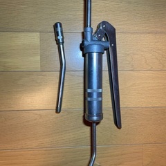 小さいグリスポンプ。の画像