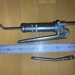 小さいグリスポンプ。の画像