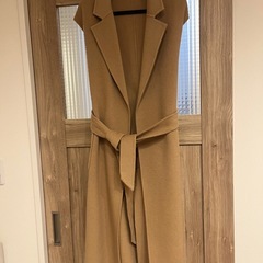 ニット、コート、鞄、スカートの画像