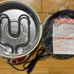 お好み焼き器  本体とお好み焼きとガラス蓋の画像