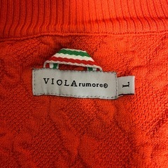 VIOLAオレンジトップスの画像