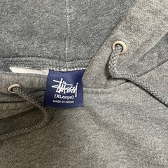 STUSSYパーカーの画像