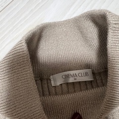 ベージュレディースセーターの画像