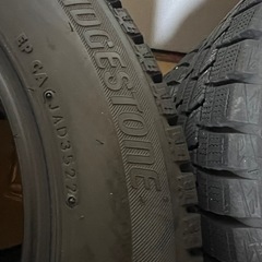 185/60r15スタッドレスタイヤbridgestone35週22年製とアルミホイール4本セットの画像