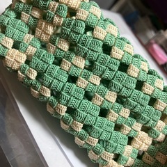 ハンドメイド　編み込みがま口ポーチの画像