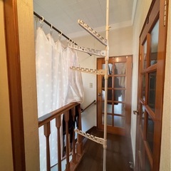 ニトリ　天井突っ張り物干し竿　の画像