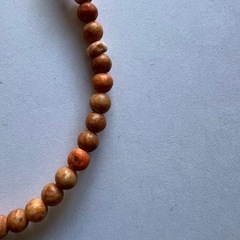 オレンジネックレスの画像