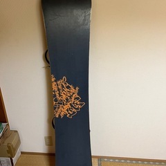 スノボー板とワックスの画像