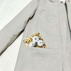 フード付きコートの画像