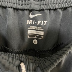 NIKE ナイキ DRI-FIT トラックパンツ ジャージ ブラック　サイズM 黒の画像