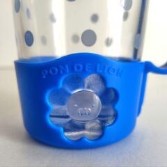 ミスド『ポン・デ・ライオン 変わるんグラス 2014』カルピス　コップの画像