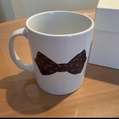 【新品未使用】TAKEO KIKUCHI 蝶ネクタイデザインマグカップの画像