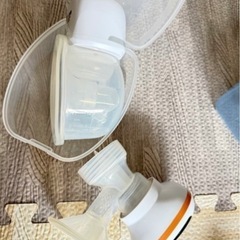  ベビー散髪器、お風呂、物干しラック3点セットと2つピジョン 電動 搾乳器の画像