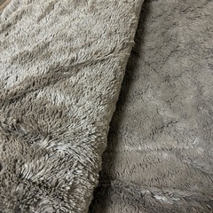 ラグ毛布ブラウン系の画像