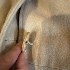 ファー付きピンクベージュロングコートの画像