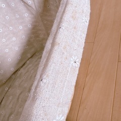 籐のカゴ　取手付きの画像