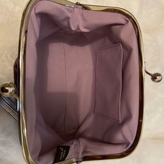 COACHパープルロゴポーチの画像