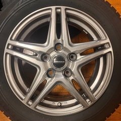 スタッドレスタイヤ（ホイール付き）BRIDGESTONE VRX 185/60/R15 ※注1本パンクしてますの画像